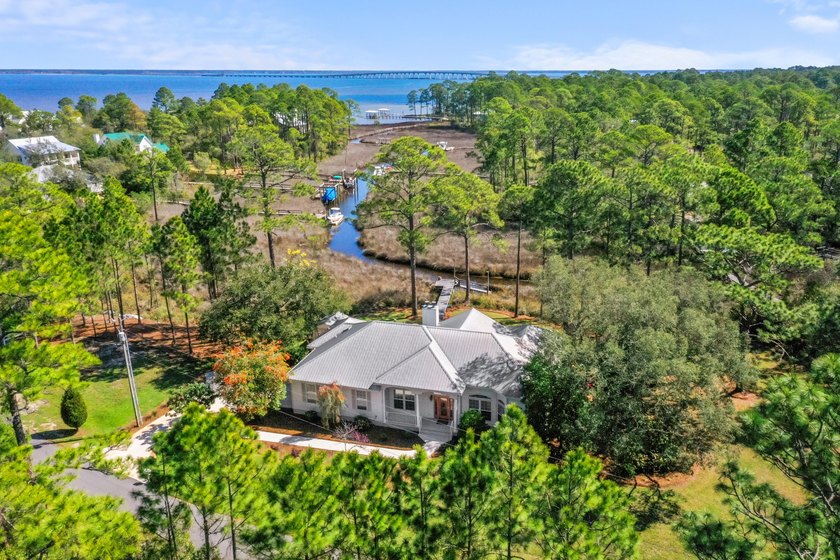 This rare 1.2-acre navigable waterfront property captures - Beach Home for sale in Santa Rosa Beach, Florida on Beachhouse.com