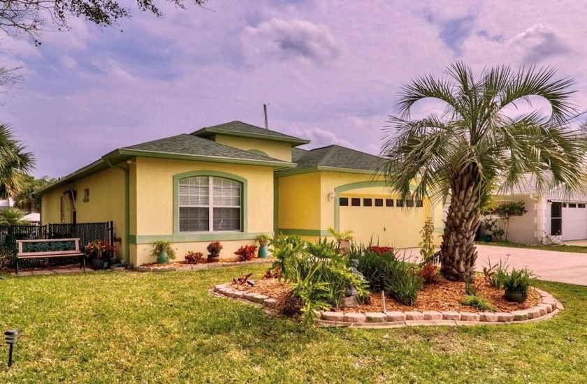 Welcome to 32 Comanche Court, Palm Coast, Florida. Nestled on a - Beach Home for sale in Palm Coast, Florida on Beachhouse.com