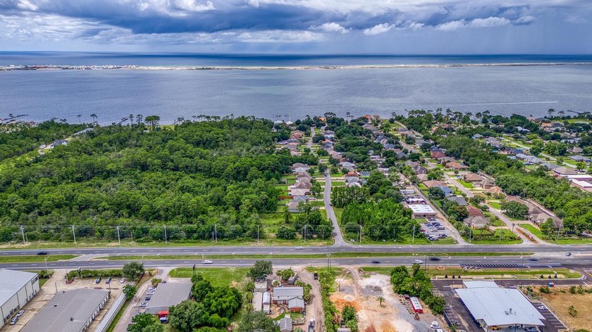 PRIME COMMERCIAL LAND in Navarre, FL - .849 AcresUnlock the - Beach Lot for sale in Navarre, Florida on Beachhouse.com