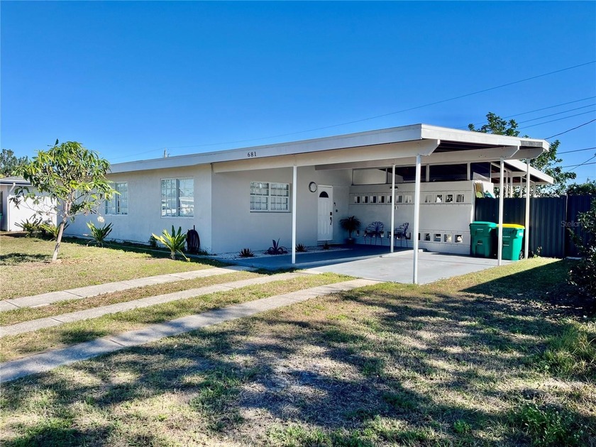 Beautifully renovated and move-in ready, this lovely 3-bedroom - Beach Home for sale in Port Charlotte, Florida on Beachhouse.com