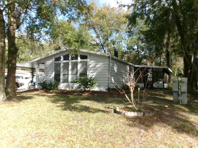 This large lovingly maintained home on a wooded lot features an - Beach Home for sale in Ormond Beach, Florida on Beachhouse.com