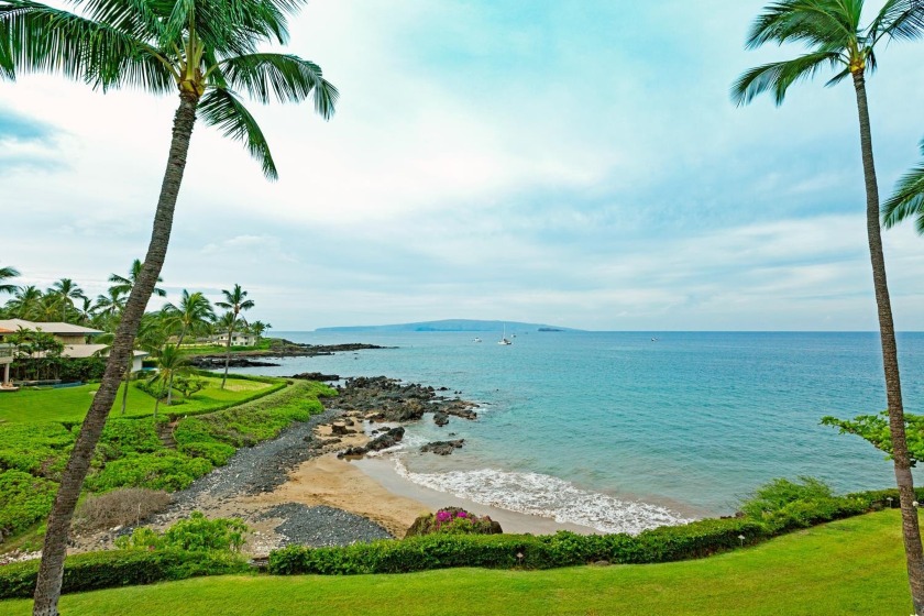 This RARE and stunning location directly on the ocean has - Beach Condo for sale in Kihei, Hawaii on Beachhouse.com