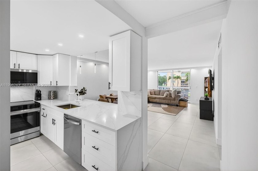 Completely re-imagined and beautifully transformed, this - Beach Condo for sale in Hallandale Beach, Florida on Beachhouse.com