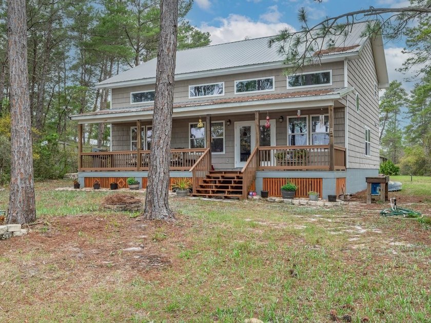 Lovely 2 story home with great view of Lake Mckissack. Beautiful - Beach Home for sale in Carabelle, Florida on Beachhouse.com