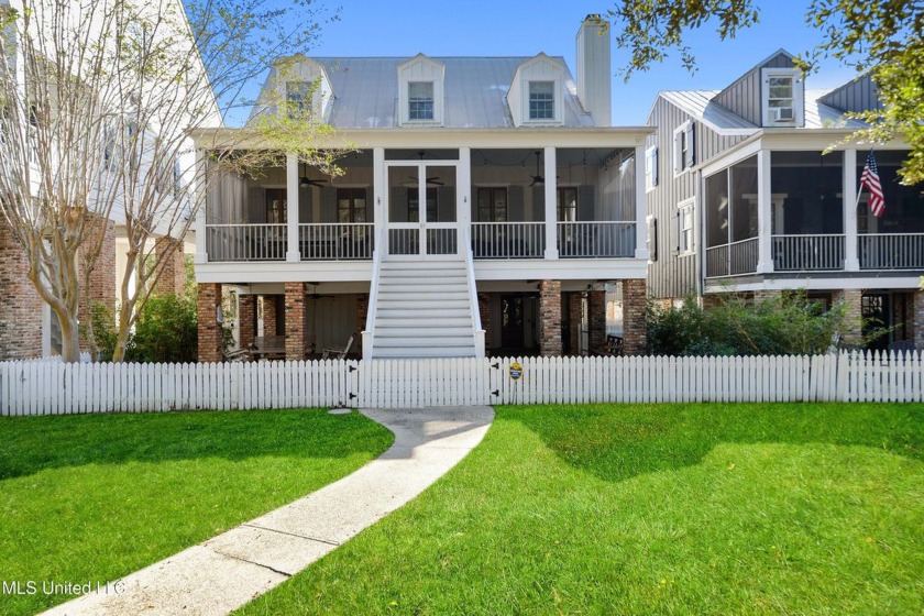 Welcome to this stunning 4-bedroom waterfront retreat, nestled - Beach Home for sale in Diamondhead, Mississippi on Beachhouse.com