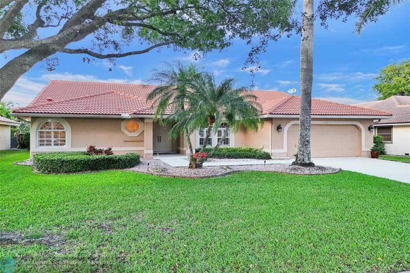 Charming 4-bedroom Pool home on inland waterway in desirable - Beach Home for sale in Coral Springs, Florida on Beachhouse.com