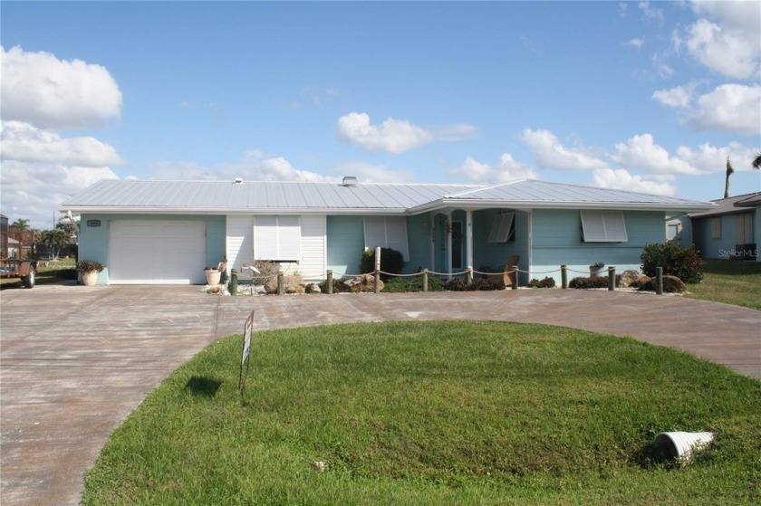 Welcome to Paradise, where you can boat from your backyard! This - Beach Home for sale in Port Charlotte, Florida on Beachhouse.com