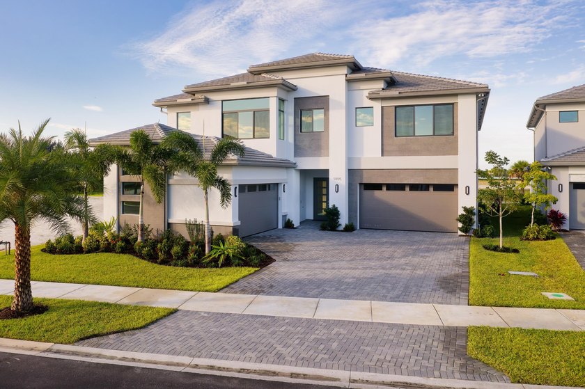 Discover the pinnacle of style in this newly constructed 5,260 - Beach Home for sale in Palm Beach Gardens, Florida on Beachhouse.com