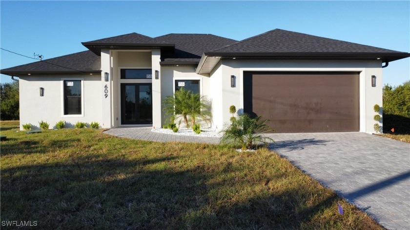 Welcome to your new dream home in Lehigh Acres! This stunning - Beach Home for sale in Lehigh Acres, Florida on Beachhouse.com