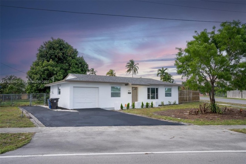 Experience modern living in this beautifully updated 4 bedroom 2 - Beach Home for sale in Lauderdale Lakes, Florida on Beachhouse.com