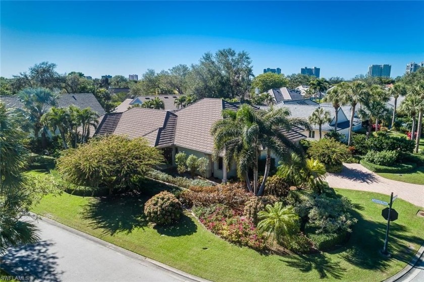 Nestled in prestigious Pelican Bay, this well-maintained estate - Beach Home for sale in Naples, Florida on Beachhouse.com