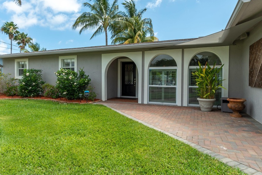 Live the waterfront lifestyle in this completely updated and - Beach Home for sale in Lake Worth, Florida on Beachhouse.com