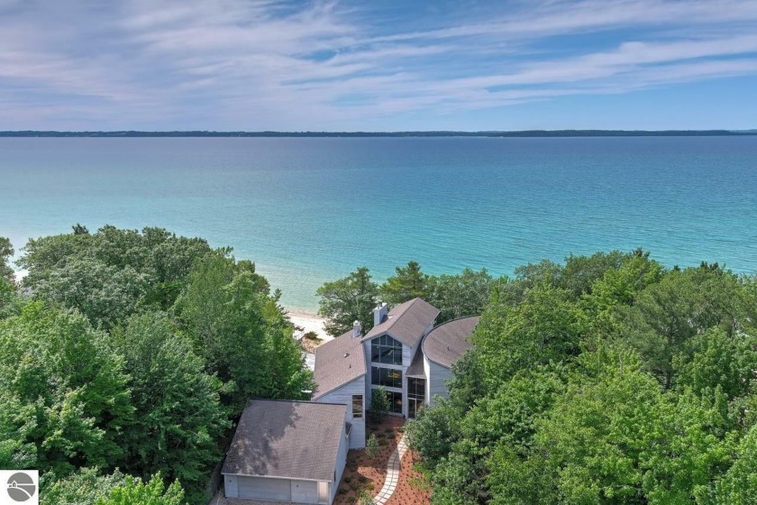 Looking for the perfect secluded getaway in a wooded lakeside - Beach Home for sale in Elk Rapids, Michigan on Beachhouse.com
