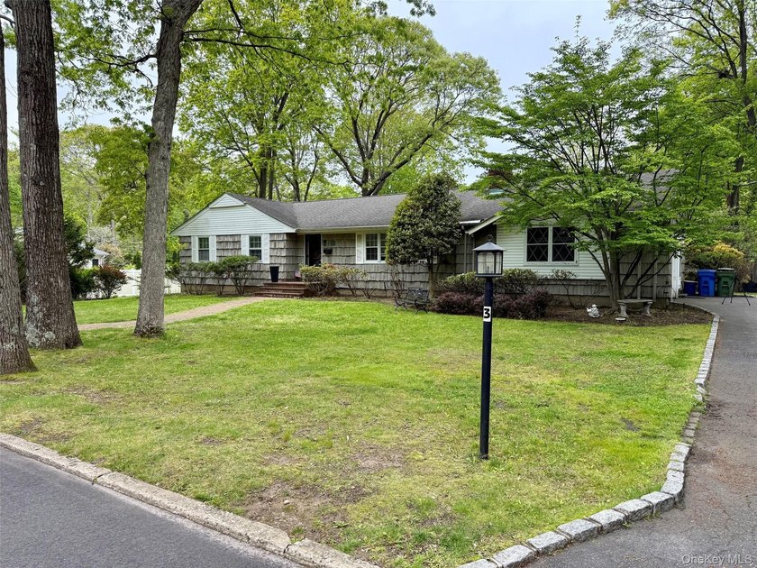 Charming ranch nestled on a quiet country-like street offering - Beach Home for sale in Port Jefferson, New York on Beachhouse.com