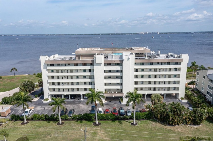 PALACIO DEL SOL END UNIT CONDO IN PGI W/SPECTACULAR HARBOR - Beach Condo for sale in Punta Gorda, Florida on Beachhouse.com