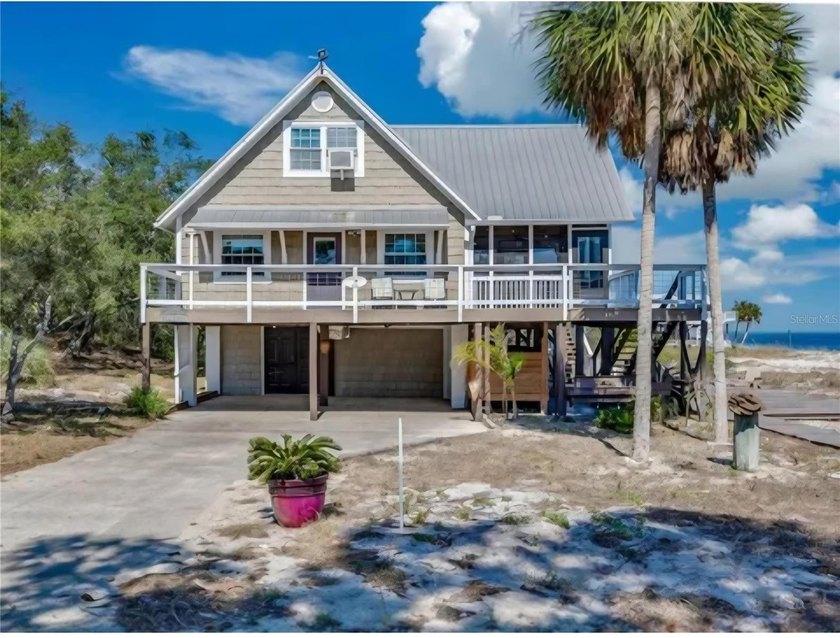 Welcome to 7 Bass St, a charming coastal retreat nestled in the - Beach Home for sale in Panacea, Florida on Beachhouse.com