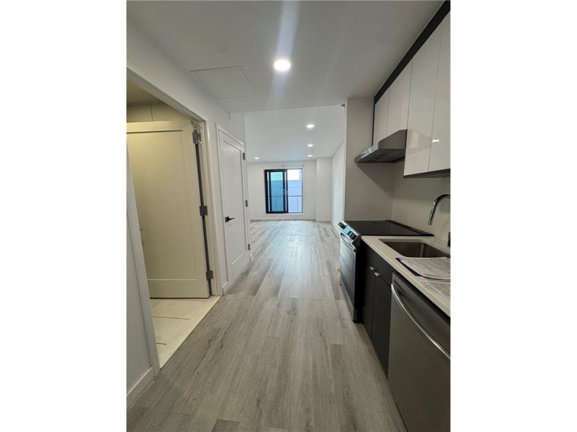 Buy a house with  parking space in a luxury elevator building on - Beach Condo for sale in Brooklyn, New York on Beachhouse.com