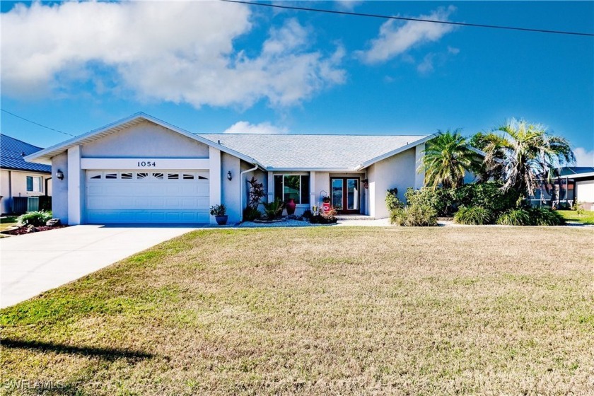 Seller says sell! Spacious Waterfront Living in Southeast Cape - Beach Home for sale in Cape Coral, Florida on Beachhouse.com