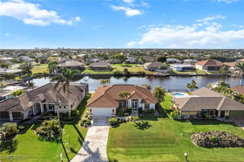 Gulf Access Pool home with Panoramic Water views overlooking an - Beach Home for sale in Cape Coral, Florida on Beachhouse.com