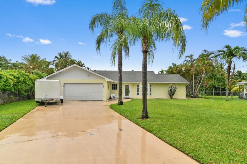 Experience the epitome of serene waterfront living in this - Beach Home for sale in Boynton Beach, Florida on Beachhouse.com