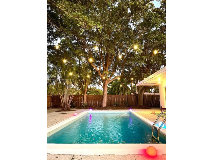 Welcome to this stunning 3-bedroom, 2-bathroom home with a den - Beach Home for sale in Pompano Beach, Florida on Beachhouse.com