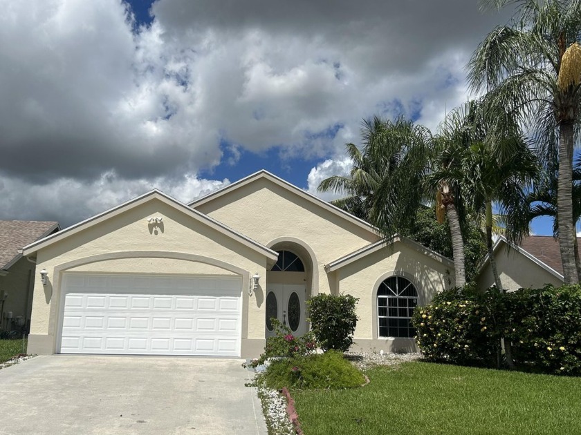 Wonderful home in the highly desirable gated community of - Beach Home for sale in Wellington, Florida on Beachhouse.com