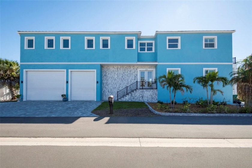 BRAND NEW (2022) CANAL FRONT HOME WITH DEEDED BEACH ACCESS ON - Beach Home for sale in Longboat Key, Florida on Beachhouse.com