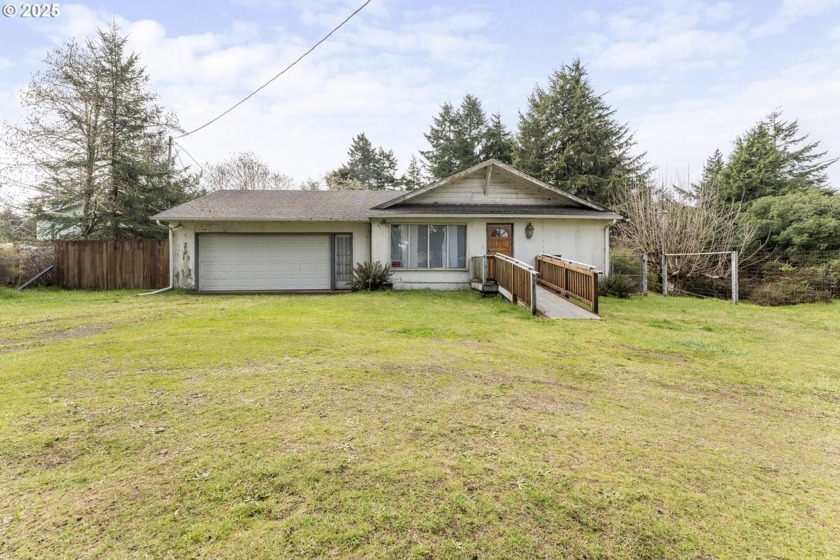 Opportunity awaits at 90730 Wilshire Ln, Coos Bay! Nestled on a - Beach Home for sale in Coos Bay, Oregon on Beachhouse.com