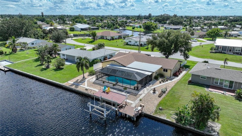 BOATERS DREAM - 5 MINUTES FROM CHARLOTTE HARBOR WITH ACCESS TO - Beach Home for sale in Port Charlotte, Florida on Beachhouse.com