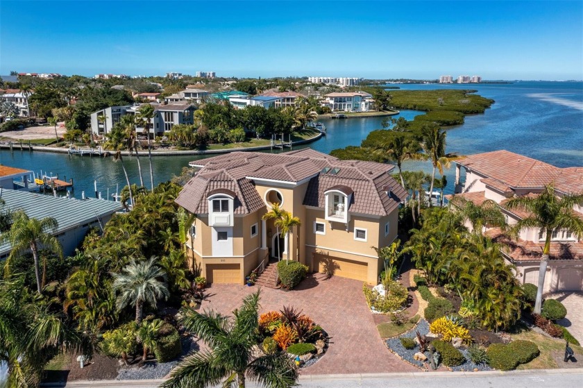 Discover a realm of unparalleled luxury as you arrive at this - Beach Home for sale in Longboat Key, Florida on Beachhouse.com