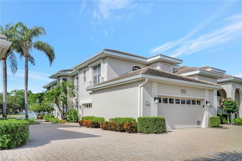 Step into this beautifully furnished first-floor coach home - Beach Home for sale in Naples, Florida on Beachhouse.com