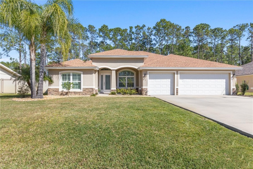 Welcome to your dream home in Palm Coast! Nestled in a serene - Beach Home for sale in Palm Coast, Florida on Beachhouse.com