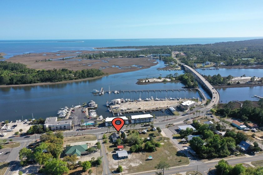 Prime high-visibility corner parcel located at Highway 98 West - Beach Commercial for sale in Carabelle, Florida on Beachhouse.com