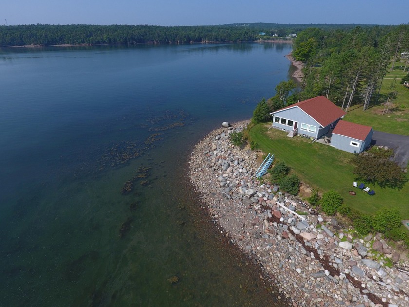 Perched on the edge of Passamaquoddy Bay, this contemporary - Beach Home for sale in Robbinston, Maine on Beachhouse.com