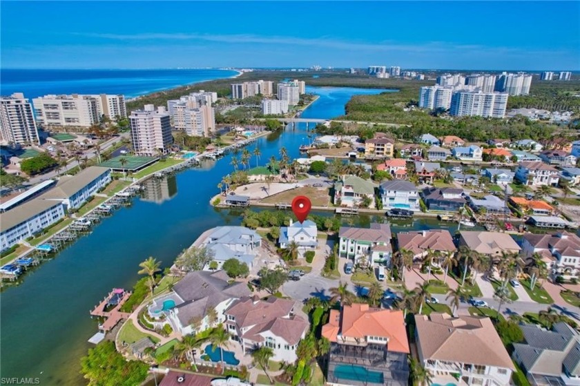 Come enjoy 145 feet of waterfront living in this Key West style - Beach Home for sale in Naples, Florida on Beachhouse.com