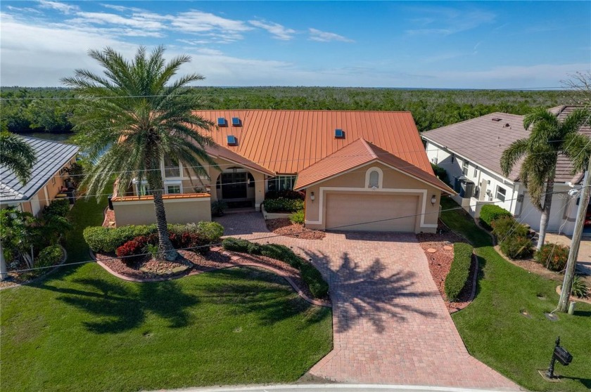 CUSTOM, 4,300 SQ FT, COURTYARD POOL HOME WITH NEW ROOF (2023) - Beach Home for sale in Punta Gorda, Florida on Beachhouse.com