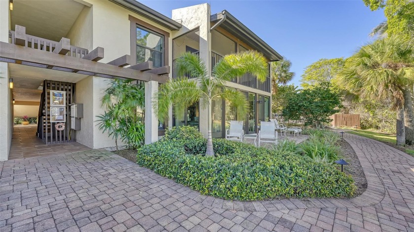 This ground-floor, two-bedroom, two-bathroom, walk-out unit with - Beach Condo for sale in Longboat Key, Florida on Beachhouse.com