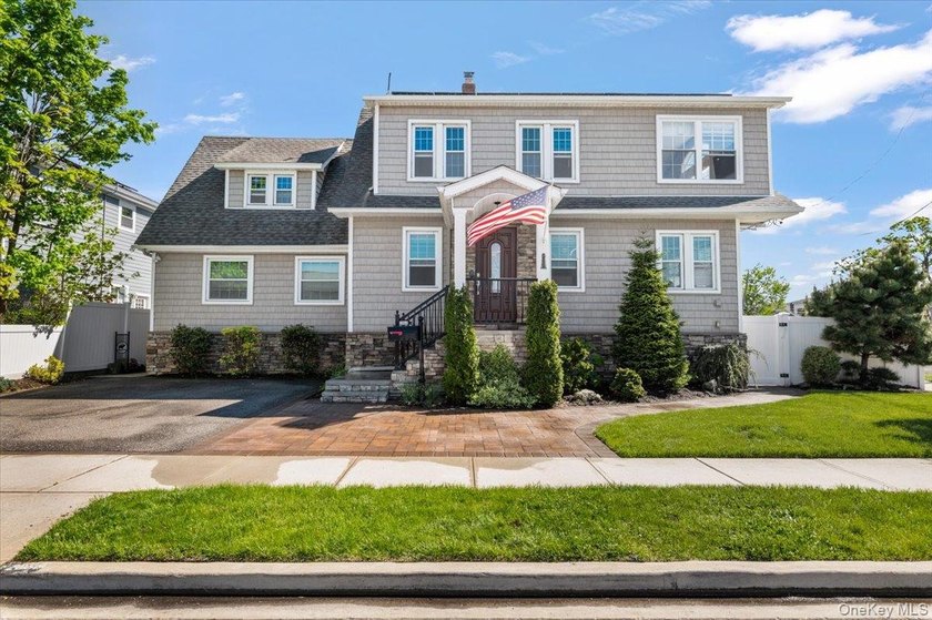 Nestled on a desirable corner lot in Wantagh, this beautifully - Beach Home for sale in Wantagh, New York on Beachhouse.com