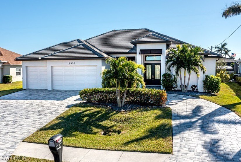 Welcome to this stunning BETTER THAN NEW residence in the highly - Beach Home for sale in Cape Coral, Florida on Beachhouse.com