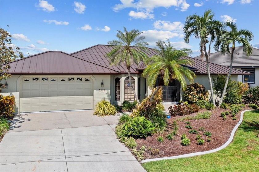 PRIME WATERFRONT LOCATION! EXCEPTIONAL 3 BEDROOM, 2 BATH, 2-CAR - Beach Home for sale in Punta Gorda, Florida on Beachhouse.com