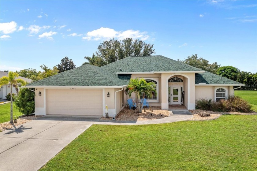 Impeccably remodeled 3-bedroom, 2-bath, 2-car garage pool home - Beach Home for sale in Punta Gorda, Florida on Beachhouse.com