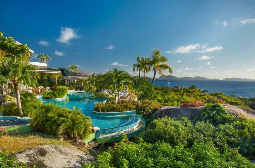 Refined resort-style living awaits at this recently renovated - Beach Home for sale in Out of Country,  on Beachhouse.com