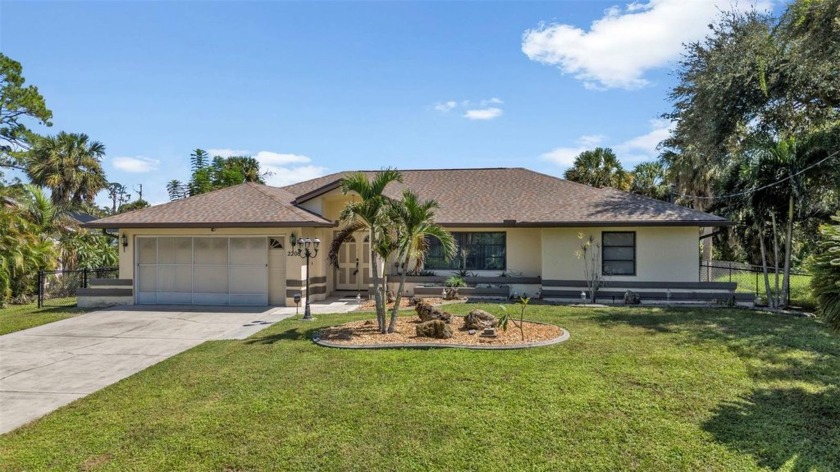 Experience the ultimate waterfront lifestyle in this - Beach Home for sale in Port Charlotte, Florida on Beachhouse.com