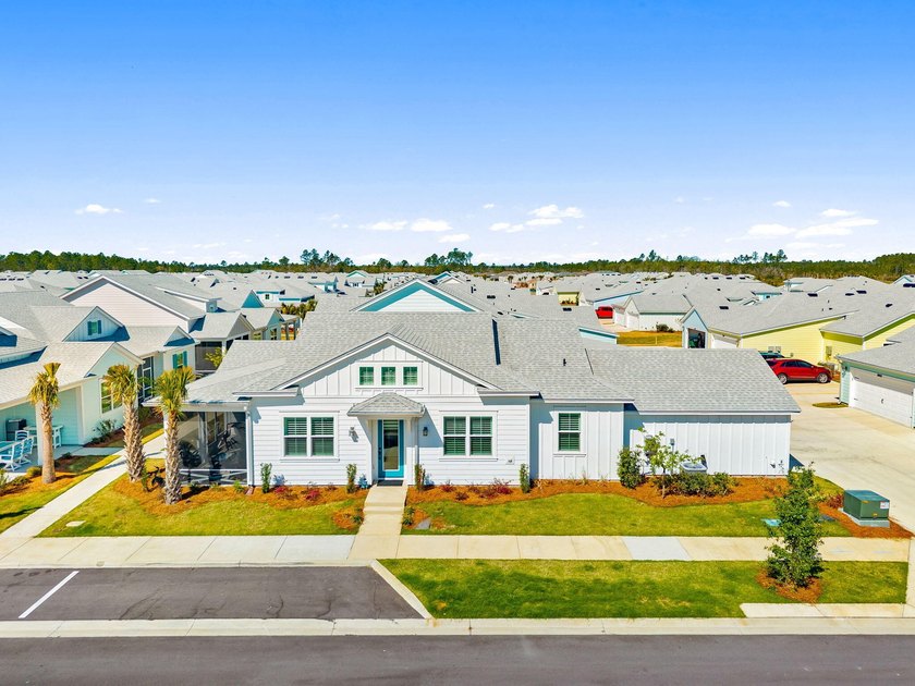 Step into this beautifully upgraded end-unit cottage in Latitude - Beach Townhome/Townhouse for sale in Panama City Beach, Florida on Beachhouse.com