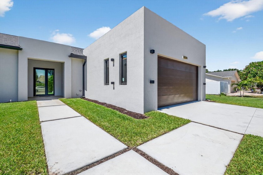 Beautiful 2025 new construction home, on a spacious 13,000 sq ft - Beach Home for sale in Palm Springs, Florida on Beachhouse.com