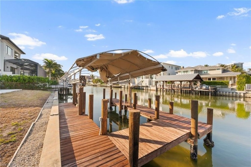 Completely renovated, this stunning canalfront home in the - Beach Home for sale in Naples, Florida on Beachhouse.com