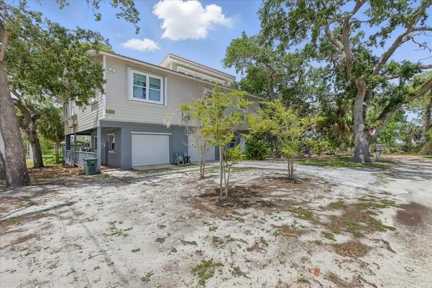 Discover the perfect blend of coastal charm and modern comfort - Beach Home for sale in Cedar Key, Florida on Beachhouse.com