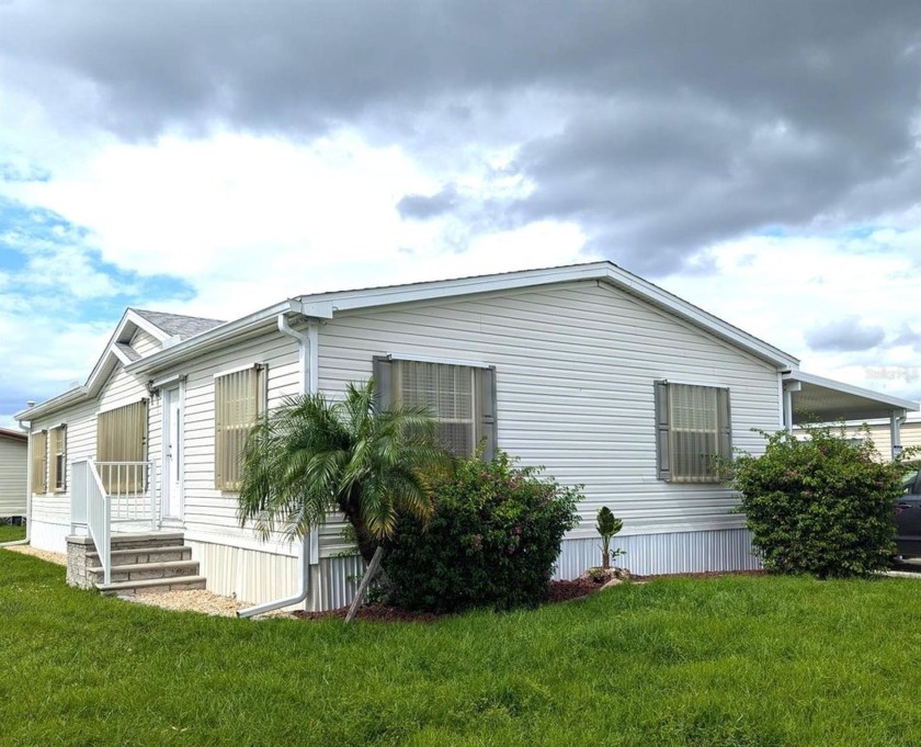 This Three Bedroom Two Bath home is located on an Interior Lot - Beach Home for sale in Punta Gorda, Florida on Beachhouse.com