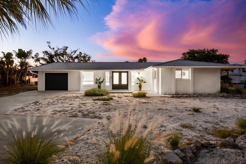 Some homes whisper. Others make a statement. 501 De Narvaez - Beach Home for sale in Longboat Key, Florida on Beachhouse.com