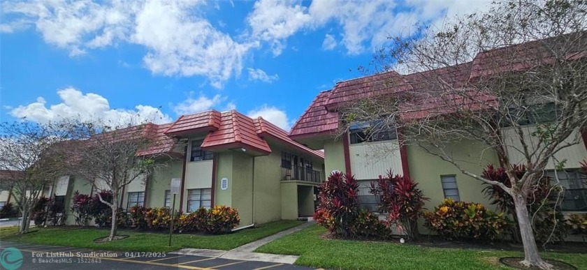 WHAT A BEAUTY !!!  CANAL VIEW SECOND FLOOR CORNER UNIT  ,  NEWER - Beach Condo for sale in Coral Springs, Florida on Beachhouse.com
